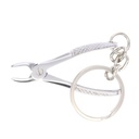 Llavero con Forma de Fórceps Dental